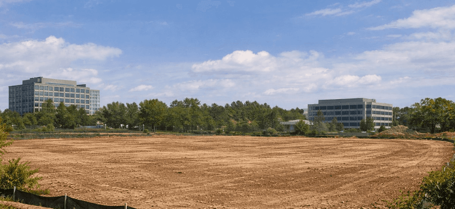 Long panoramic utility easement cleared through heavy timber with pristine grade